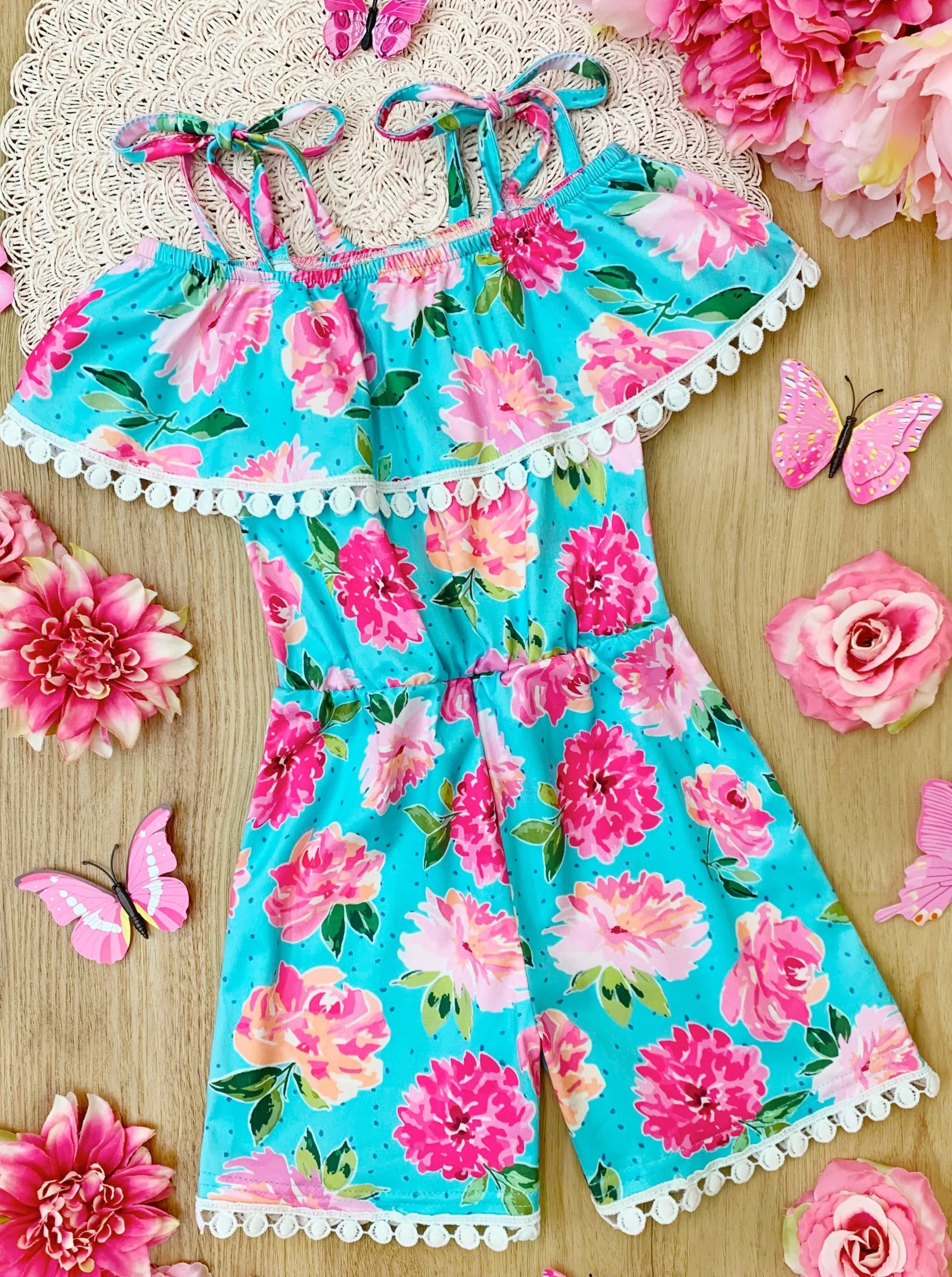 You Da Pom Floral Tassel Trim Romper